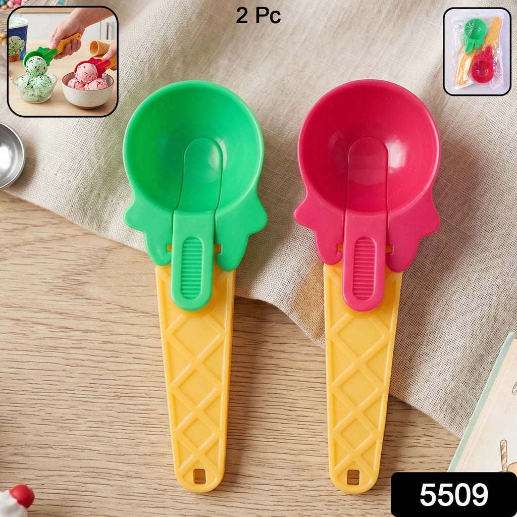 Close-up of the comfortable ergonomic handle on a red plastic ice cream dipper.