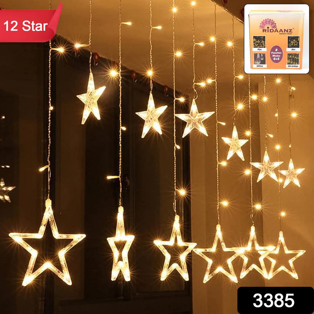 Close-up of the glowing 12 star LED string lights, showcasing their warm white illumination.