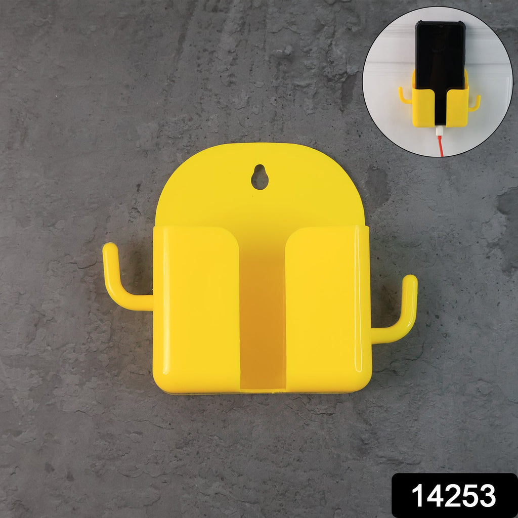 Mobile phone holder mounted on wall featuring a functional hook