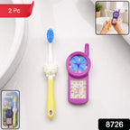 Close-up of a blue kids cartoon toothbrush with soft bristles and fan toy