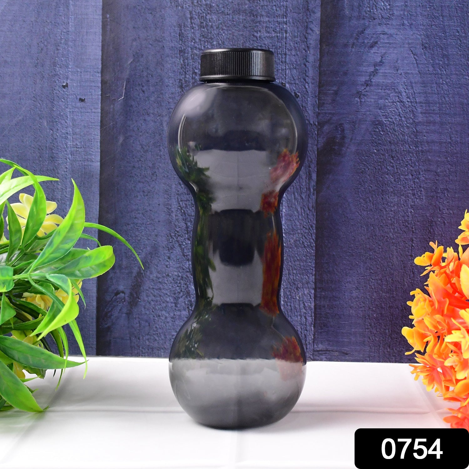 Close-up of the secure, leakproof cap and comfortable handle of the dumbbell water bottle.