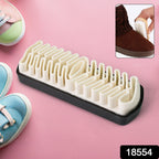 Close-up of sole scrub shoe cleaning brush for dirt removal