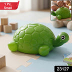 Close-up of coin slot on tortoise money bank