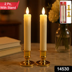 Close-up of LED flameless taper candle showing realistic flame light and classic design