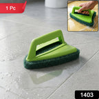 Close-up of the ergonomic handle and abrasive scrubber head for bathroom cleaning.
