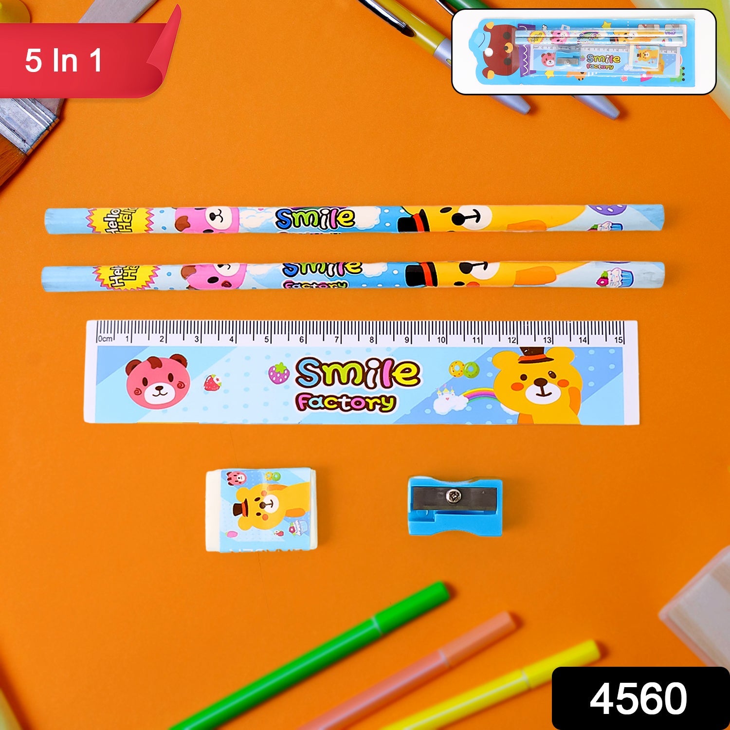 Close-up of a wooden pencil, ruler, and sharpener with playful prints.