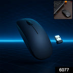 User demonstrating the portable Wireless Mouse on a laptop, highlighting its compact size.