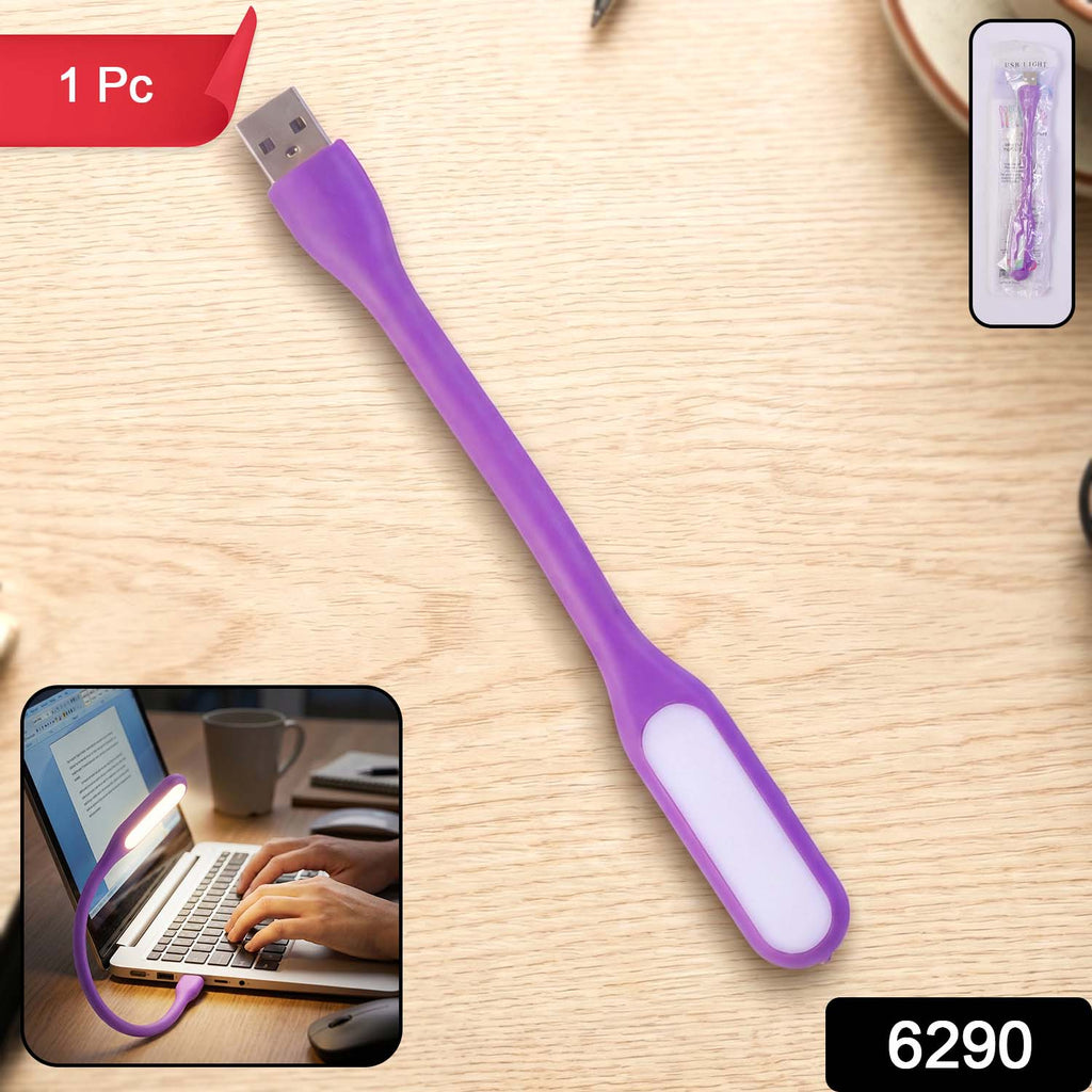 Compact purple Flexible USB LED Light with bendable neck on a study desk.