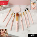 Assorted 9-in-1 makeup brushes and face puff laid out on white background