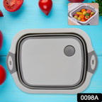 Multi-functional collapsible cutting board used as a dish washing basin.