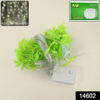 Close-up of decorative LED leaf string light featuring warm white LEDs and green leaves