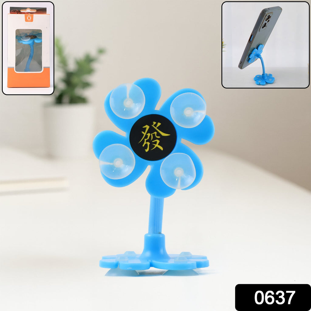 Adjustable flower design mobile stand securely holding a smartphone in a car.