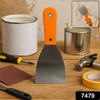 Close-up view of the ergonomic soft-grip rubber handle on the putty knife, ensuring comfort.