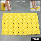 Anti-slip bathroom massage mat securely placed on shower floor with suction cups