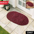 Textured red oval floor mat ideal for high-traffic areas