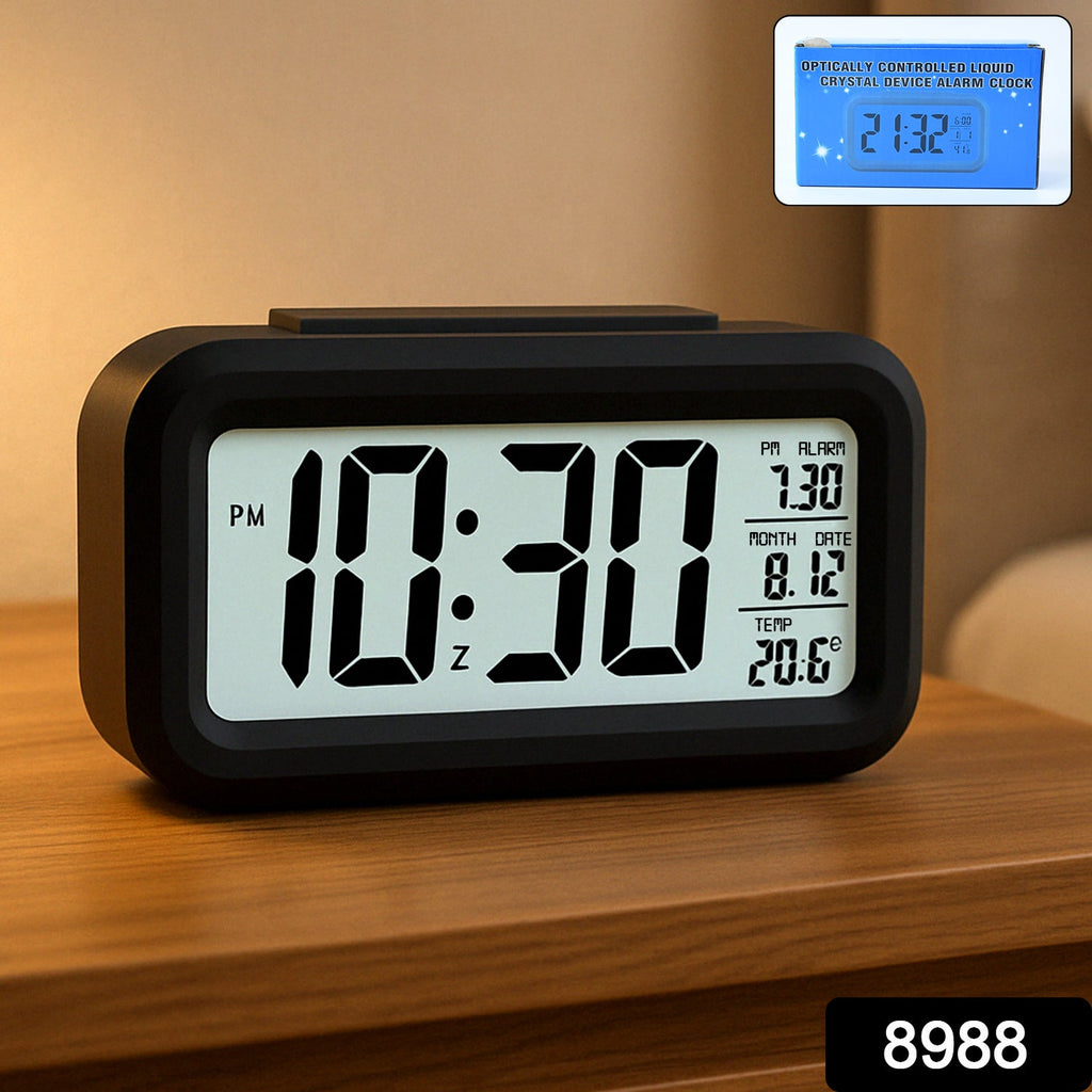 Night view of digital LCD alarm clock with soft glowing backlight