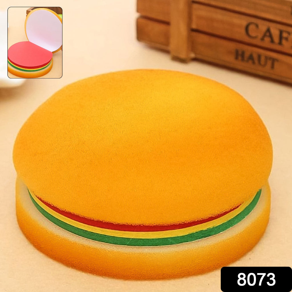 Stack of multicolor burger sticky notes next to a pen, ready for jotting down important memos.