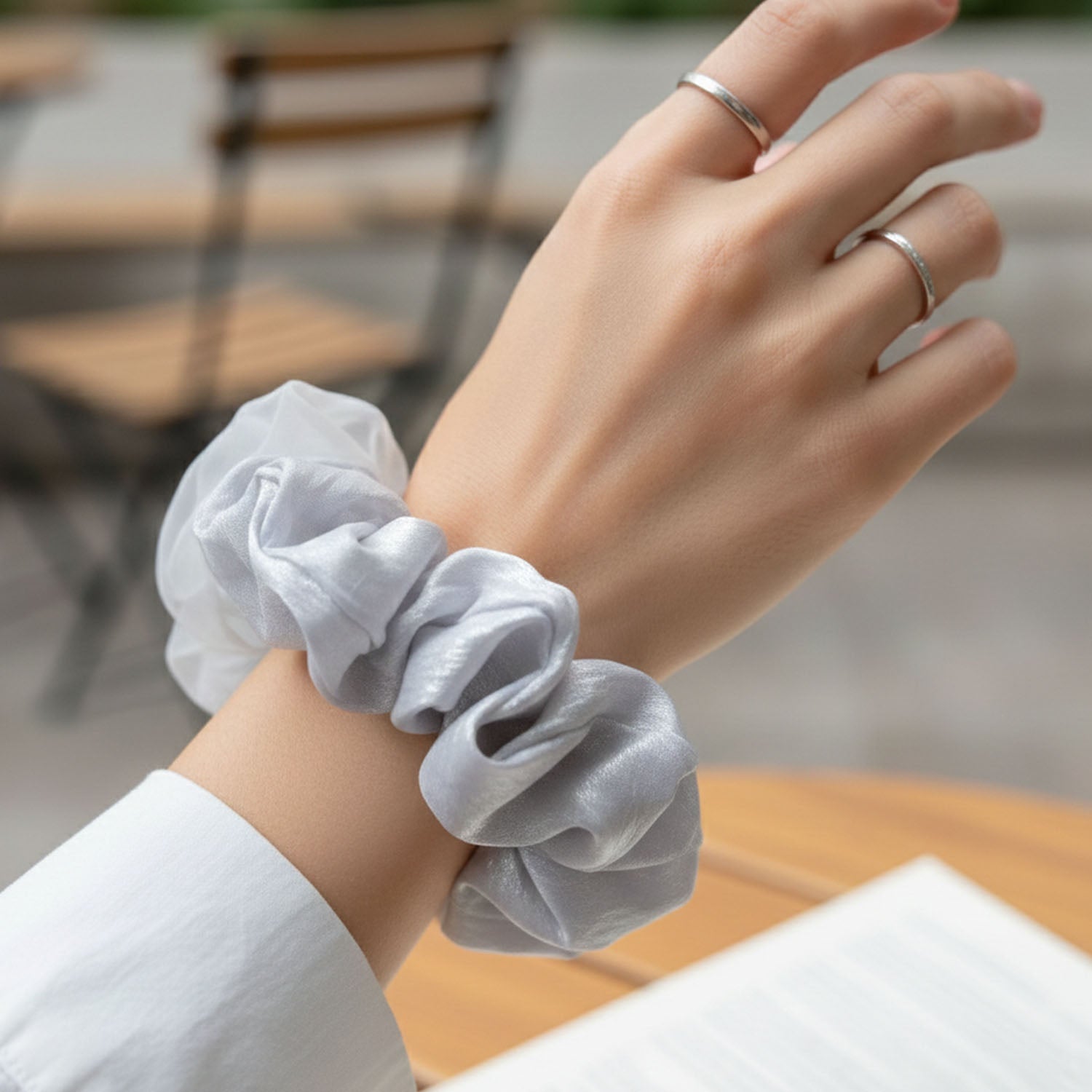 Detailed shot of satin mesh hair scrunchie material and construction
