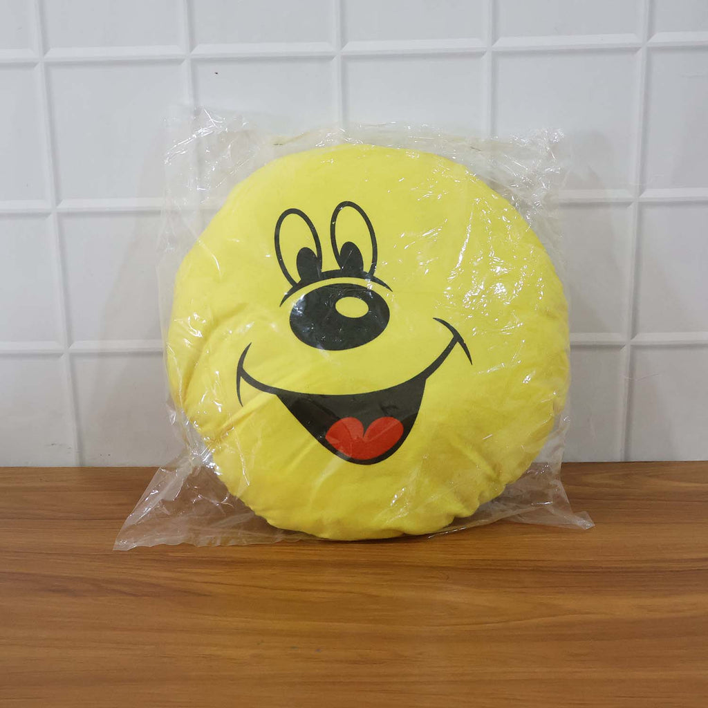 Smiley face plush pillow cushion in a colorful kids’ room setting
