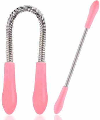A woman holding the portable spring facial hair remover, ready for use.
