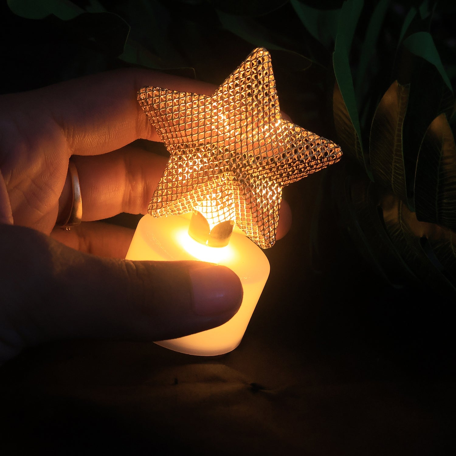Flameless LED star candles arranged as a decorative centerpiece