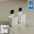 Two adhesive wall mounted toothbrush holders ready for easy installation