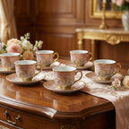 Elegant floral tea cup and saucer set with decorative gold rim