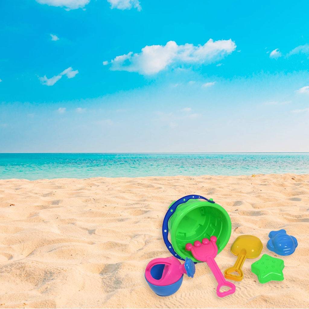 Kids building a sandcastle with the 6-piece beach sand castle toy set.