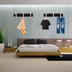 Usage example of the wall mounted coat rack in a home hallway holding various items