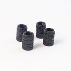 Single silver aluminium tire valve stem cap on clean white background