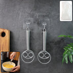 Close-up of stainless steel spiral whisk with open-coil head