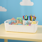 Stacked white plastic storage baskets in clean arrangement