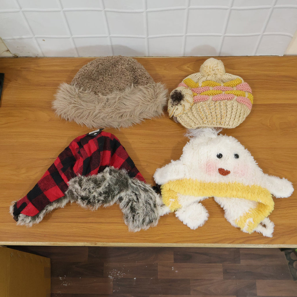 Person wearing all-season woolen and summer cap in outdoor setting