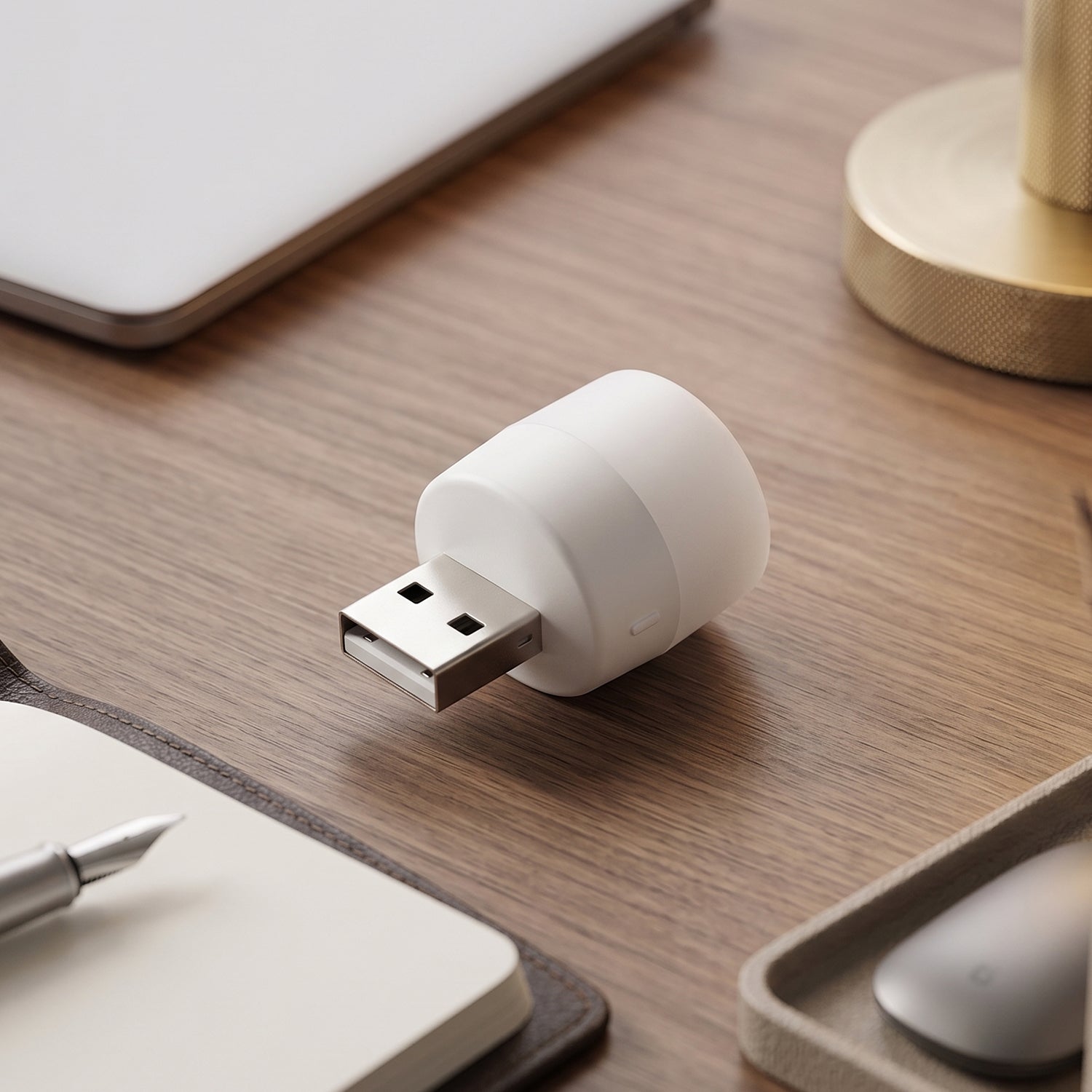 Portable yellow USB LED night light plugged in for desk use