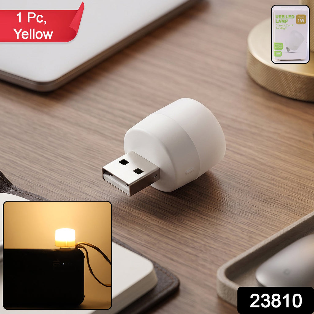 Compact yellow USB LED lamp with packaging showing product branding