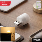 Compact yellow USB LED lamp with packaging showing product branding