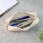 Stylish PU leather stationery case with durable stitching and a compact design.